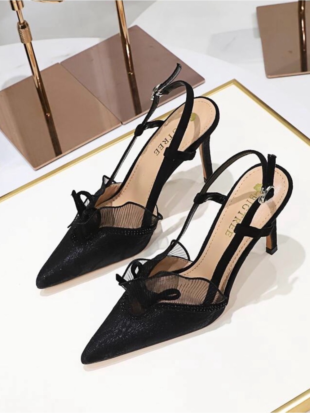Elegant Black Pointed-Toe Slingback Heels with Bow Detail